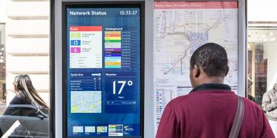 customer looking at network status board