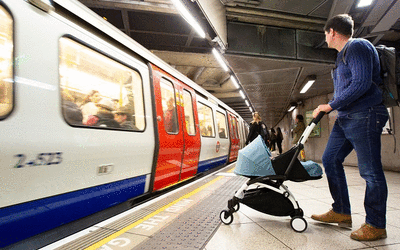 Buggy waiting for Tube train